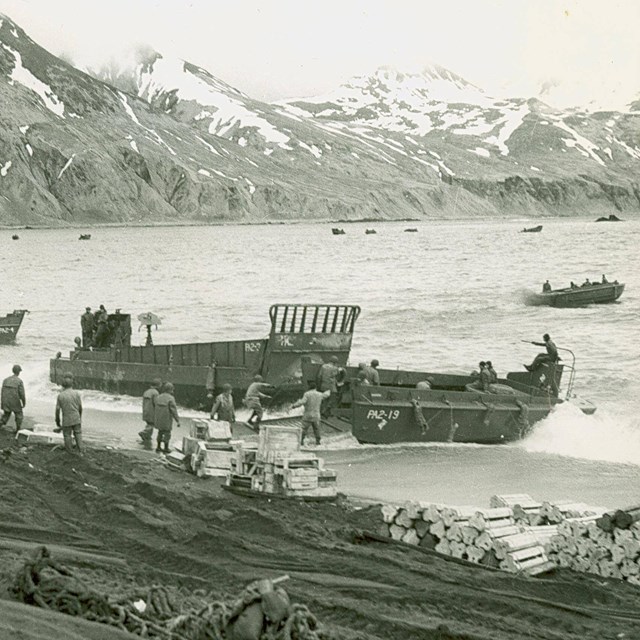 B&W picture of boats landing in WWII